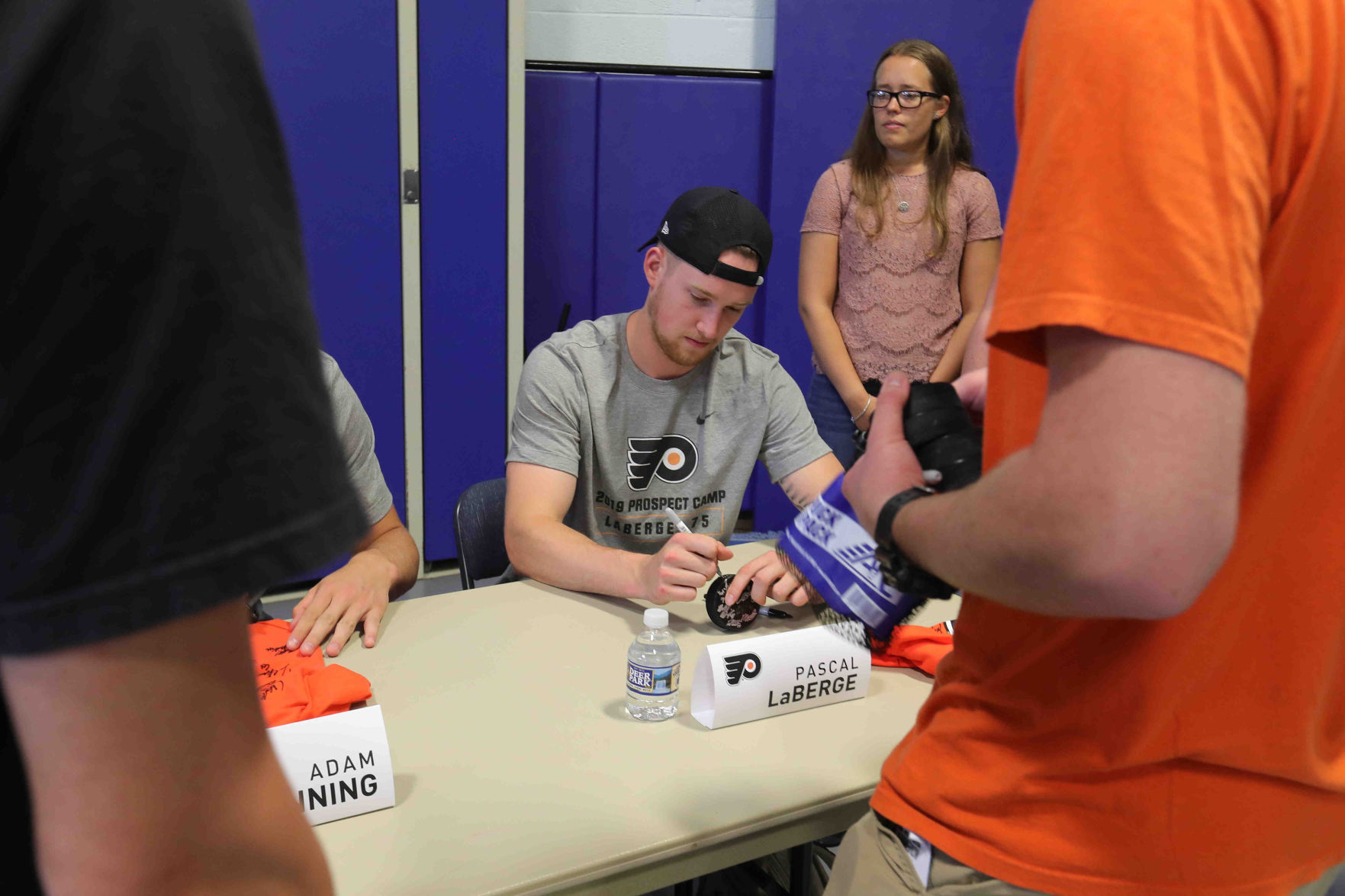 Philadelphia Flyers prospects sign autographs and play volleyball